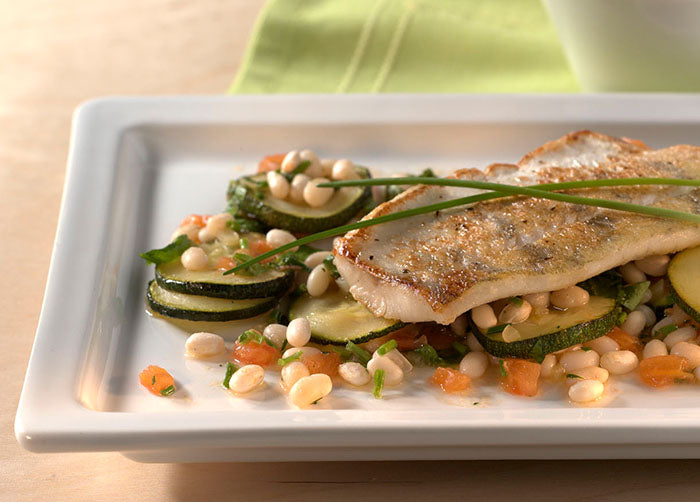 zanderfilet-auf-gebratenen-zucchini-in-bohnen-kraeutervinaigrette.jpg